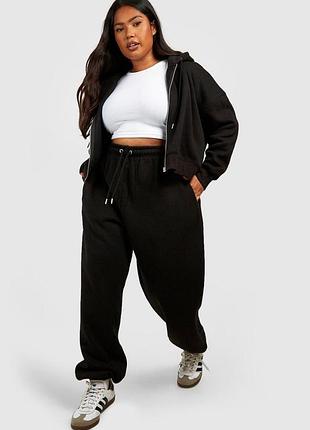 Жіночі утеплені штани на великий зріст