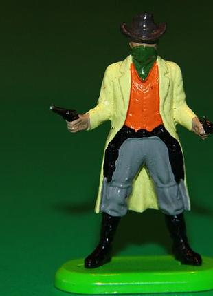 Ковбой в плаще с револьверами britains 54мм Англия