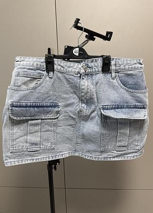 Жіноча джинсова юбка або баска з карманами