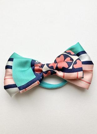 Гумка з бантом у бірюзово-рожевих відтінках