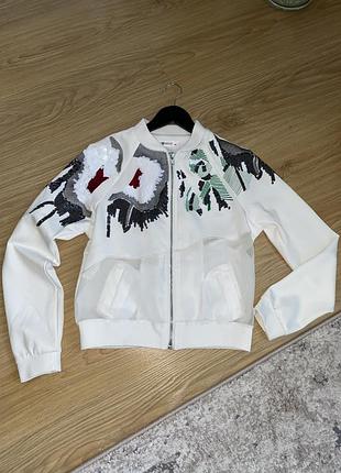 Кофта на змійку замок жіноча extelle кольору шампань із стразами