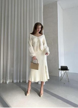 Нова стильна спідниця міді із розрізом