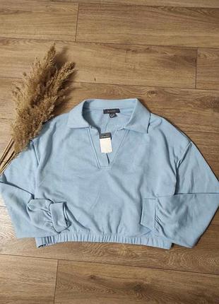 Світшот поло вкорочена голубого кольору, розмір с-л, є фото на тілі