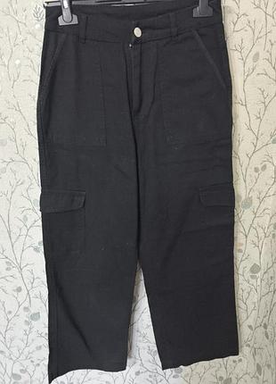 Брюки широкі