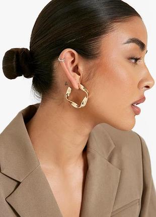 Золотисті сережки  boohoo нові