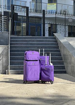 Большой чемодан дорожный тканевый нейлон l польша на колесах wings с подшипником