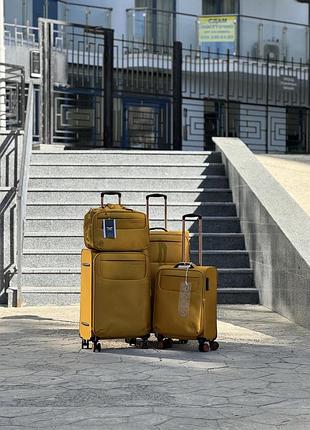 3 шт комплект валіз дорожніх тканинна нейлон  польща на колесах wings з підшипником