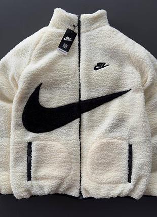 Двостороння куртка nike, найк. чорного або білого кольору, дуже тепла, нова.