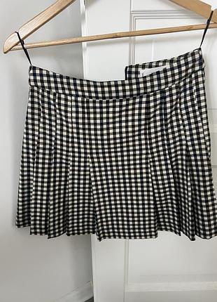 Коротка спідниця плісе