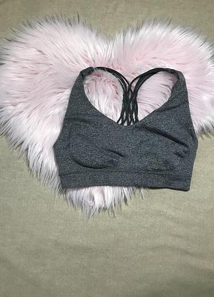 Спортивний топ з переплітом на спинці