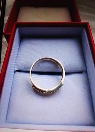 Срібне кільце з накладкою золота.