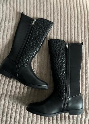 Чоботи високі