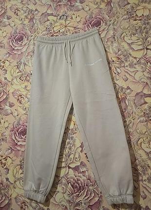 Бєжеві спортивні штани на флісі