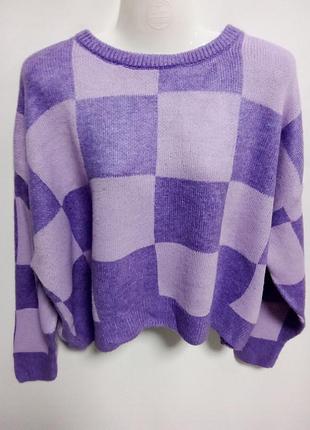 Джемпер у клітинку.
бузковий колір