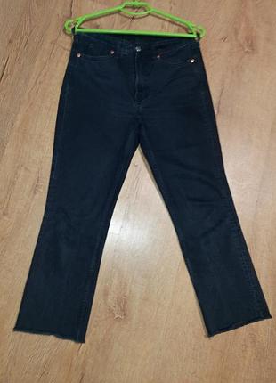 Джинсы с необработанным низом