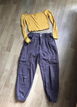 Брюки з карманами жіночі