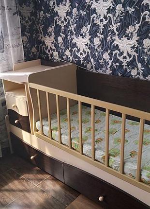 Детская кроватка трансформер с маятником