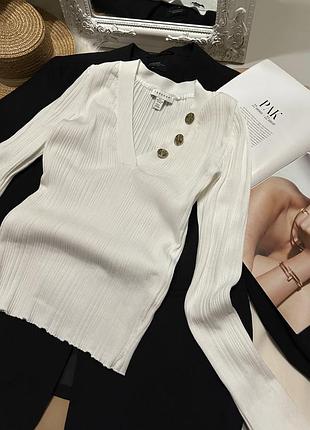 Біла жіноча кофтинка