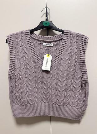 Вʼязана жилетка