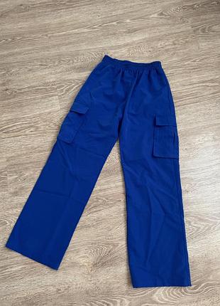 Штани сині