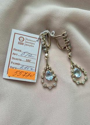 Золоті сережки підвіски з натуральним топазом та фіанітами.