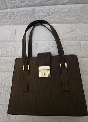 Вінтажна сумка з патинованої шкіри з замком і ключем