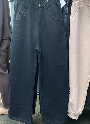 Теплі жіночі джинси на флісі