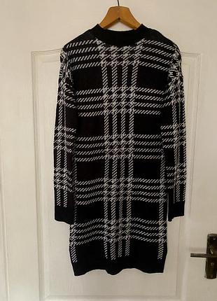 Жіноче трікотажне плаття в довжину міді. прямого крою.у клітинку. стан нового. розмір 36 /s/44  38/m/46
