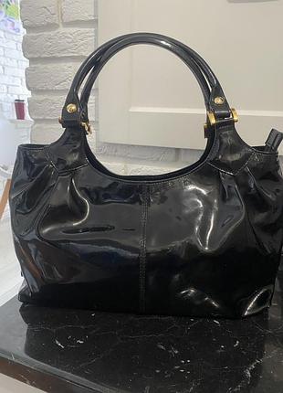 Велика чорна шкіряна сумка італіанського  бренду artigiano .