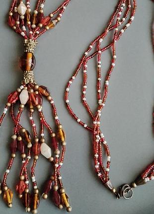 ---

винтажное этническое ожерелье, сотуар из бисера
редкое винтажное ожерелье в теплых оттенках янтаря, карамели и красного 100см.