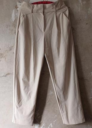 Жіночі брюки від бренду mng (mango)