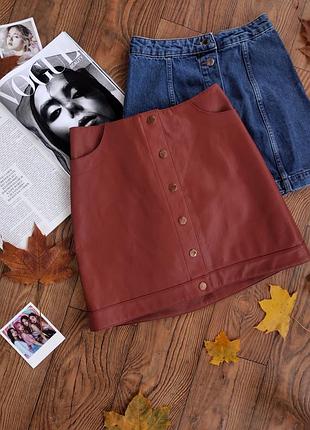 Кожаная юбочка на кнопках