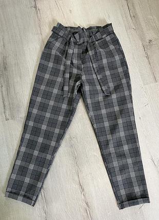 Штани в клітинку