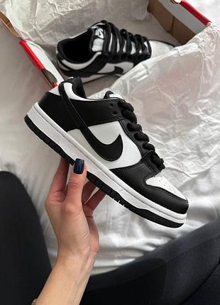 Nike sb dunk low white black fur