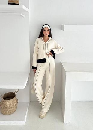 Повсякденний костюм з кофтою на блискавці з контрастними манжетами з широкими штанами