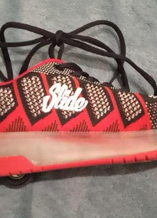 Кроссовки-ролики slide