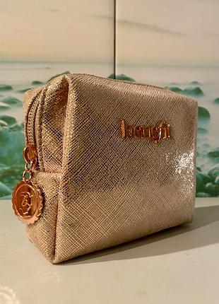 Benefit розкішна золота косметичка