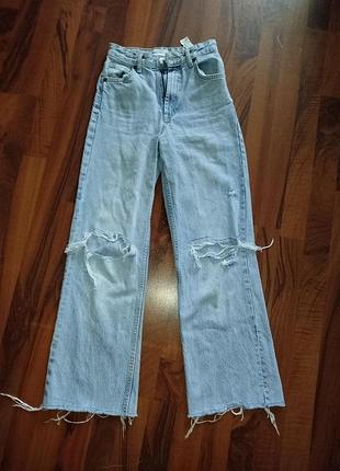 Рваные джинсы