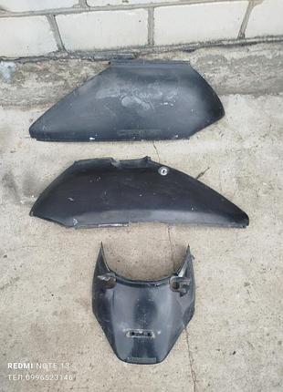Бічні обтічники чорні honda lead af48 (пластик боковий )