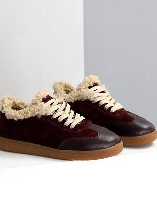 Натуральні утеплені кросівки на плоскій підошві