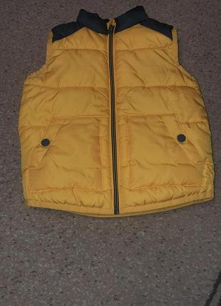 Жилетка, безрукавка