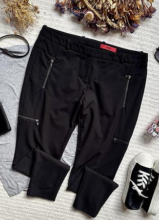 Класичні базові плотні завужені брюки з декором у вигляді замків