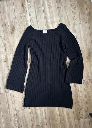 Трендова трикотажне вязане плаття оригінал в рубчик сукня тепле з кльошними широкими рукавами