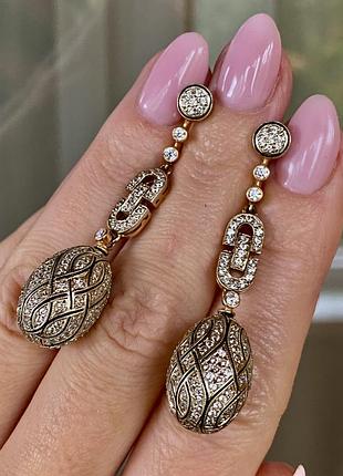 Довгi срiбнi сережки з позолотою