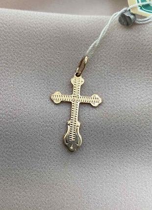 Золотий хрестик з алмазним гравіюванням.