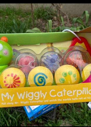 Іграшка каталка весела гусениця