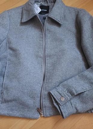 Новая женская куртка серого цвета