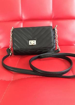 Маленька жіноча сумочка