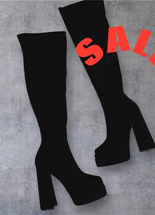 Ботфорти на високому каблуку