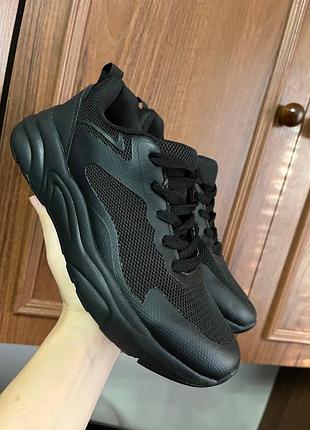 Чорні кросівки  спортивні